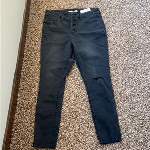 Skinny black distressed jeans